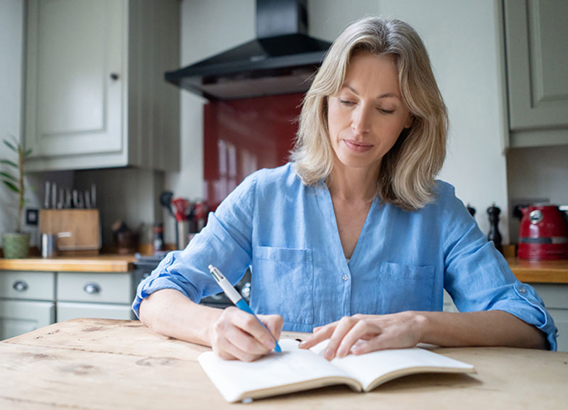 woman-sitting-and-journaling