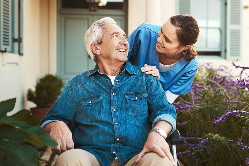caregiver-and-handicapped-senior-talking