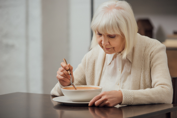 Uninterested senior lady with lack of appetite